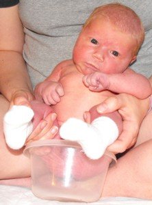 Honor on her potty bowl at a few days old