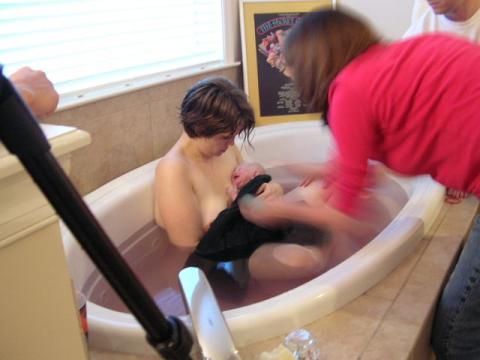 sophianna and mama in the tub just after birth