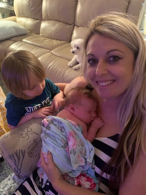Mom holds her newborn baby