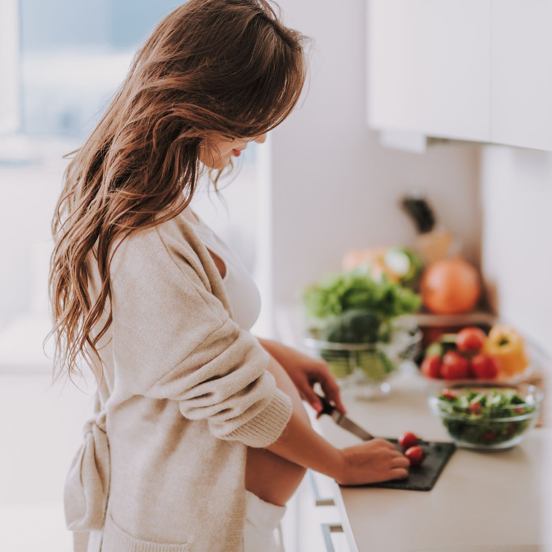 Pregnant mom prepares nourishing food