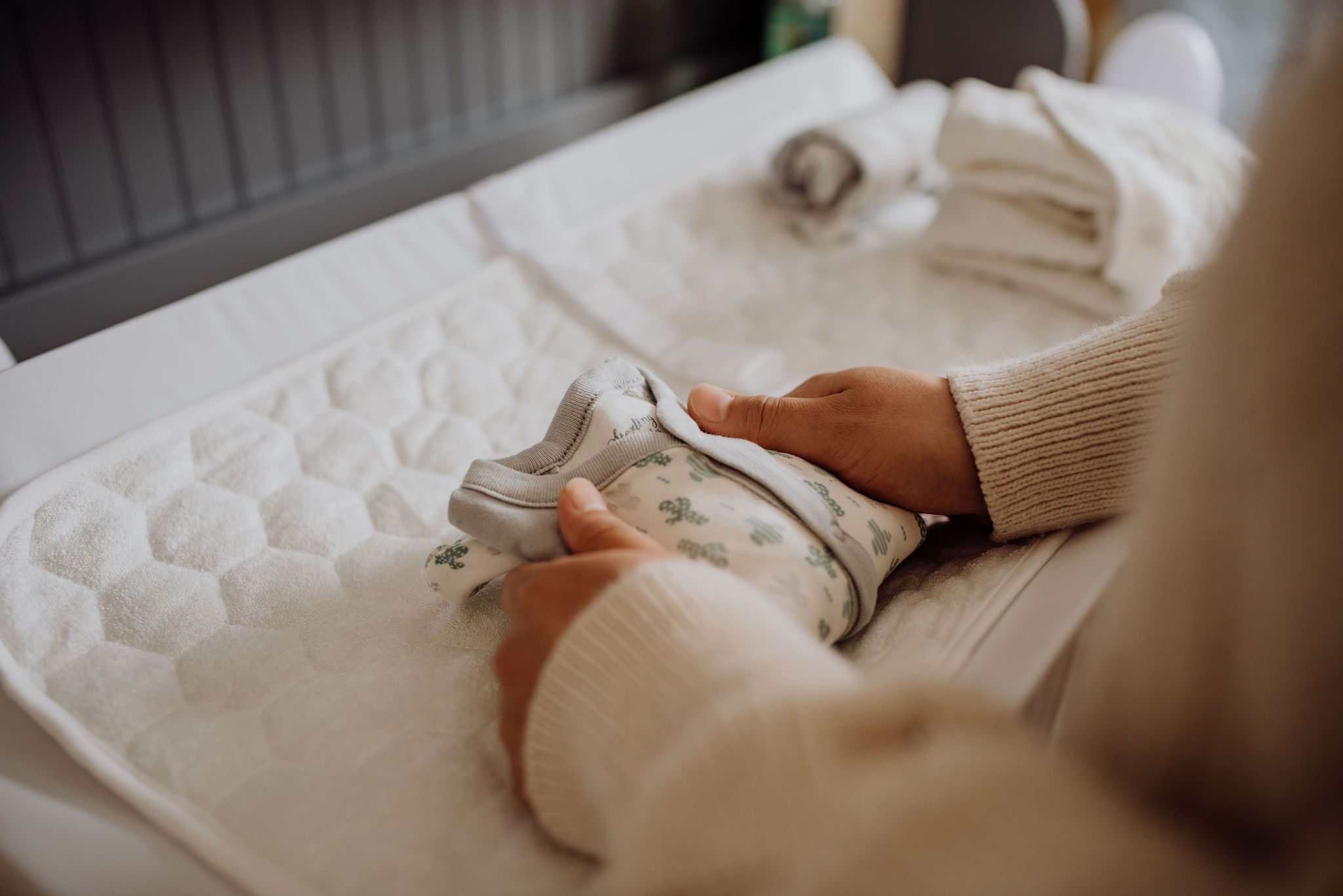 Intro to Holistic Fertility Woman holding baby item